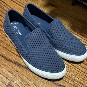 Women’s navy Sperry slip on sneakers